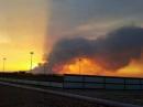 The Dog Head Fire now covers more than 16,000 acres, and the smoke column can be seen many miles away.